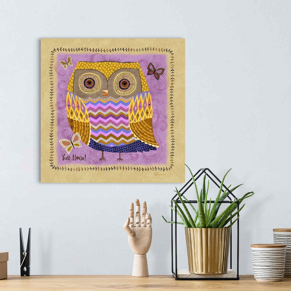 A bohemian room featuring Contemporary artwork with a retro feel of a purple owl against blueish green background.