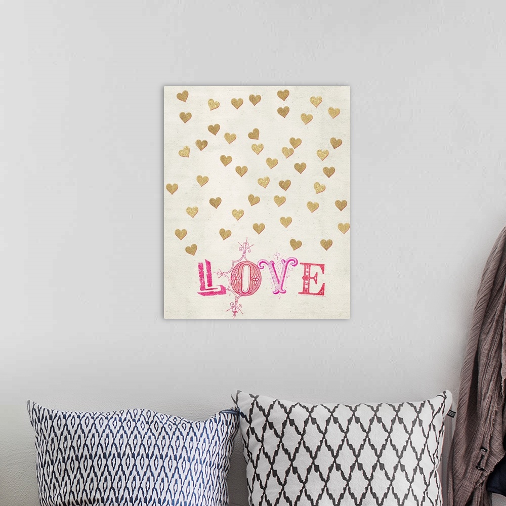 A bohemian room featuring Golden hearts and the word Love in pink against a weathered neutral background.