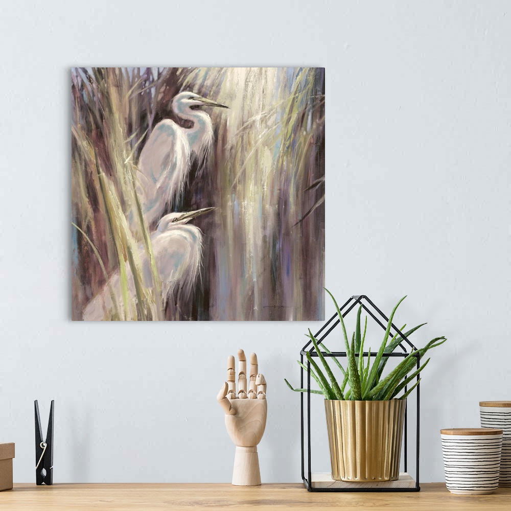 A bohemian room featuring Contemporary painting of two herons standing a-midst tall grass.