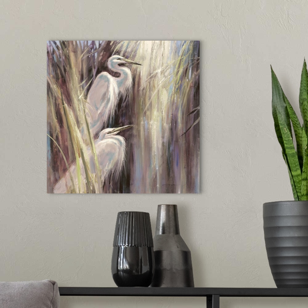 A modern room featuring Contemporary painting of two herons standing a-midst tall grass.
