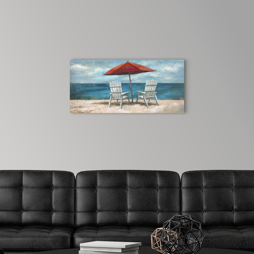 A modern room featuring Contemporary painting of white lounge chairs sitting under an umbrella on the beach, looking out ...