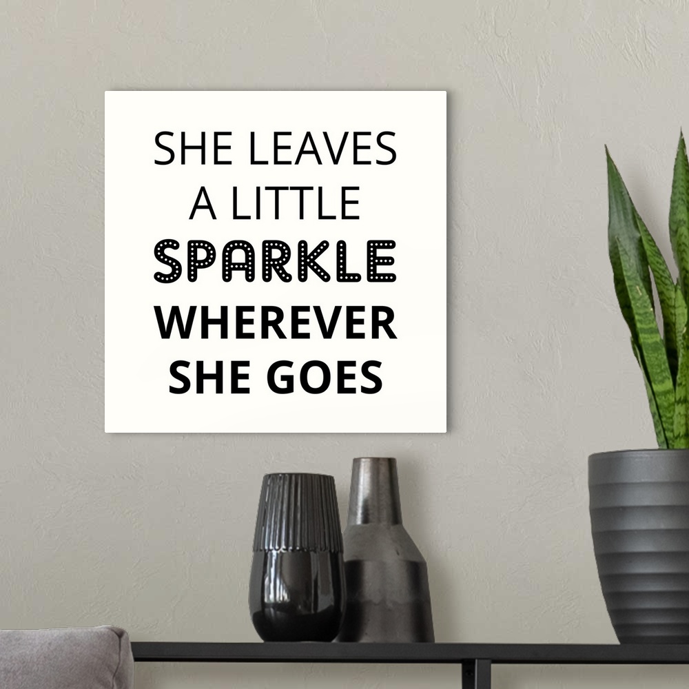 A modern room featuring She Leaves A Little Sparkle