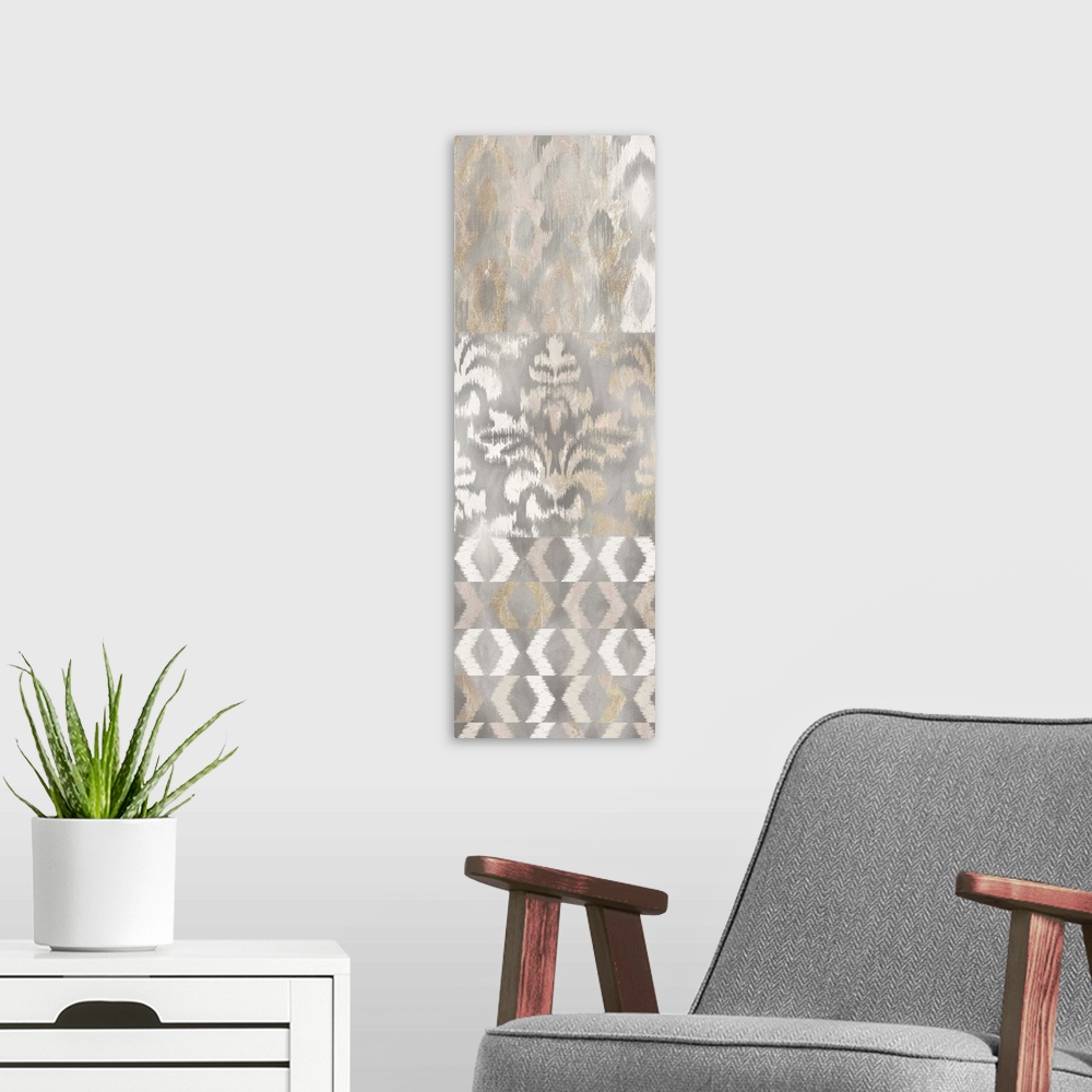A modern room featuring Large panel decor with brown, silver, white, and gold colored ikat patterns.