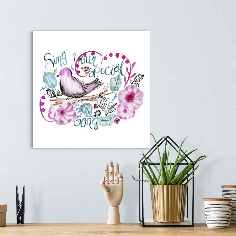 A bohemian room featuring Watercolor florals and bird with a handlettered sentiment.