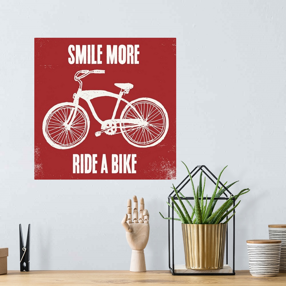 A bohemian room featuring Smile More Ride a Bike