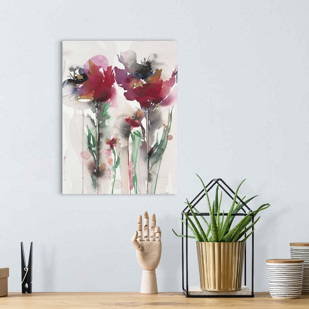 A bohemian room featuring Contemporary artwork of watercolor flowers with vibrant colors.