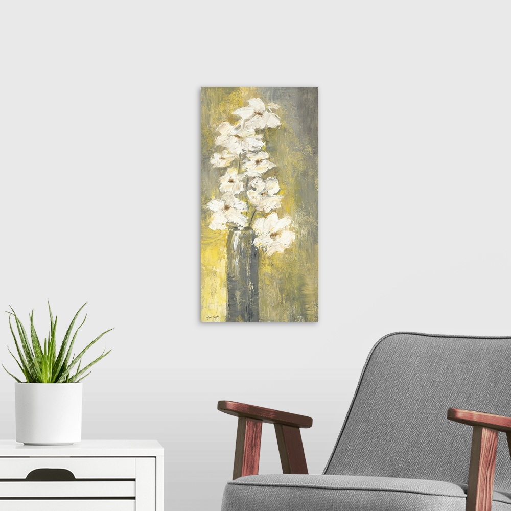 A modern room featuring Contemporary still life painting of white flowers in a thin vase.