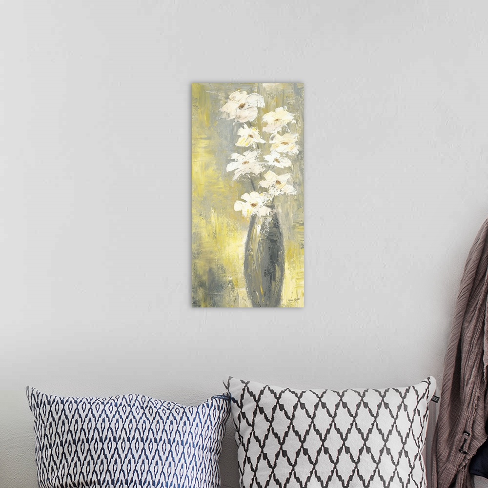 A bohemian room featuring Contemporary still life painting of white flowers in a thin vase.
