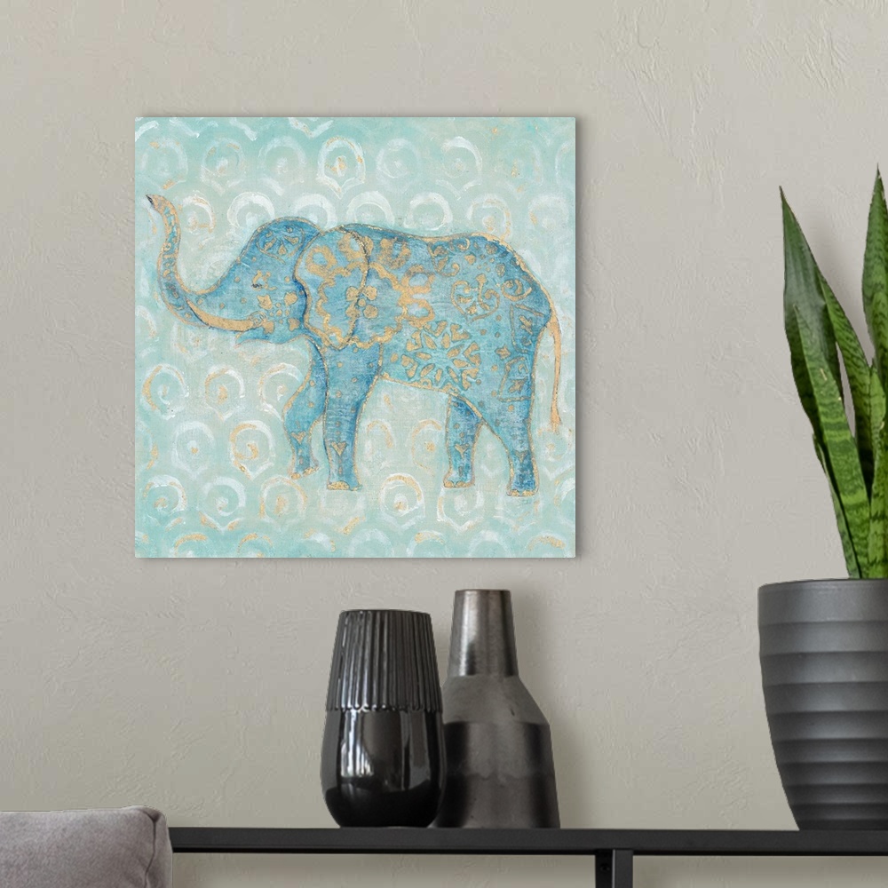 A modern room featuring Artwork of an Indian Elephant in blue with a golden design on a pale blue patterned background.