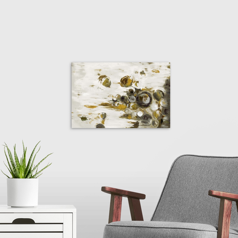 A modern room featuring Home decor abstract artwork of dark dingy green circles of different sizes against a neutral back...