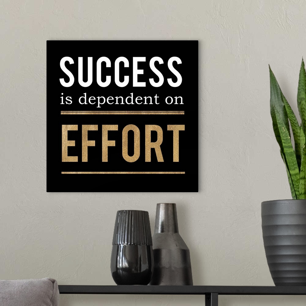 A modern room featuring Square office decor with "Success is dependent on Effort" written in white and gold on a black ba...