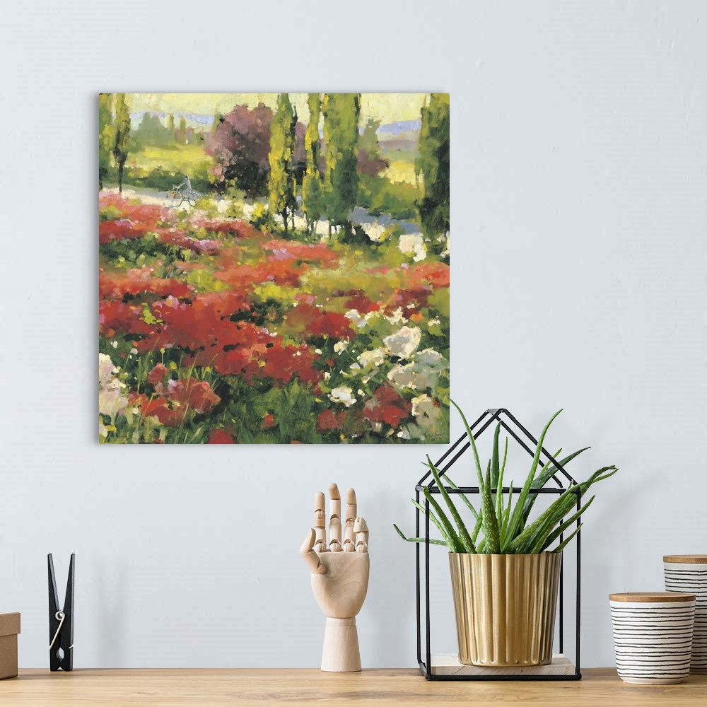 A bohemian room featuring Contemporary painting of a field of wildflowers in a valley, overlooking a countryside road.