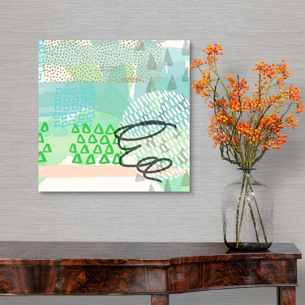 A traditional room featuring Abstract artwork in tropical shades of teal, green, and peach, with triangular shapes and a black...