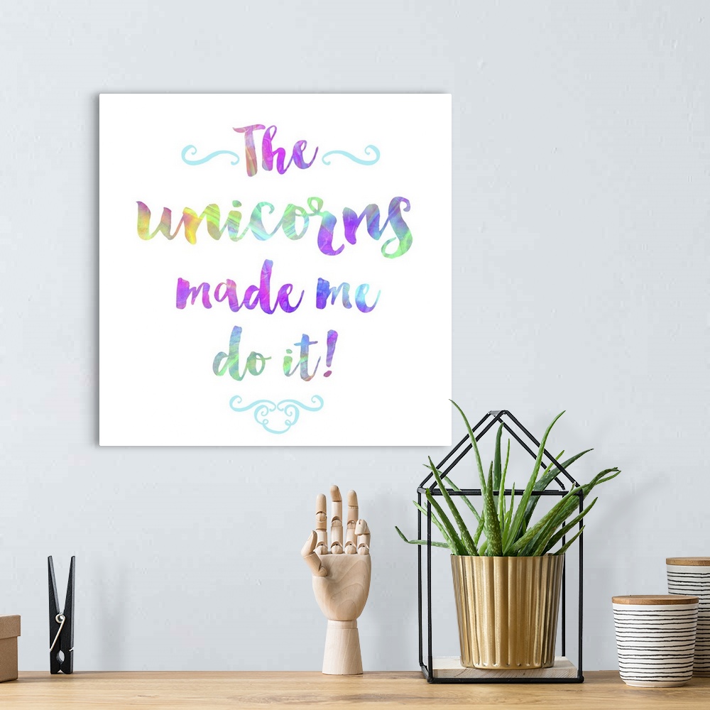 A bohemian room featuring "The Unicorns Made Me Do It" written in bright, rainbow colored text on a square background.