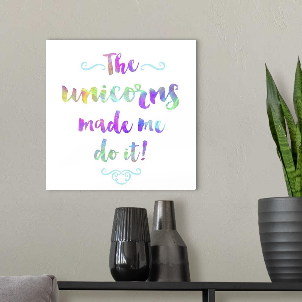 A modern room featuring "The Unicorns Made Me Do It" written in bright, rainbow colored text on a square background.
