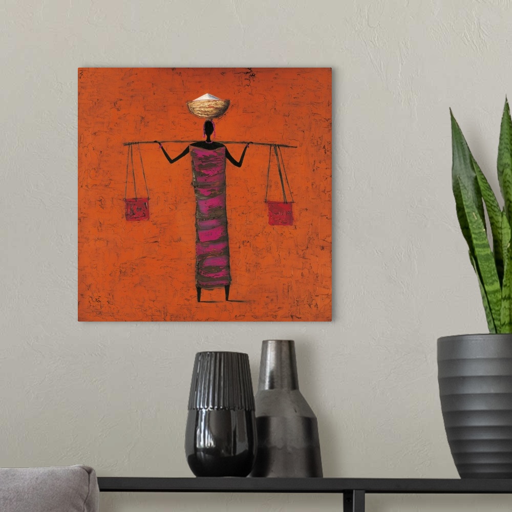 A modern room featuring Contemporary painting of tribal figure carrying food and supplies.