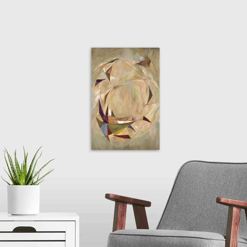 A modern room featuring Contemporary abstract artwork of triangular shapes forming a circle against a neutral background.