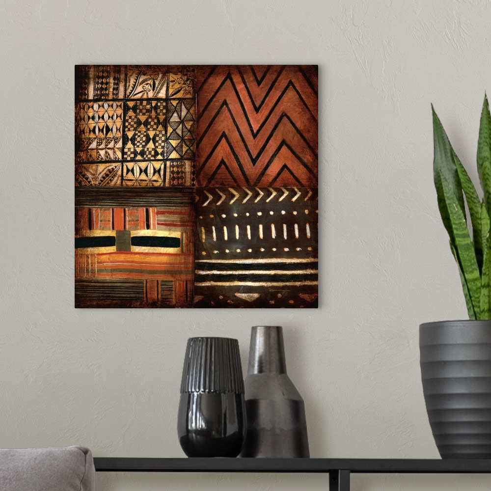 A modern room featuring Contemporary earth toned tribal patterned artwork.