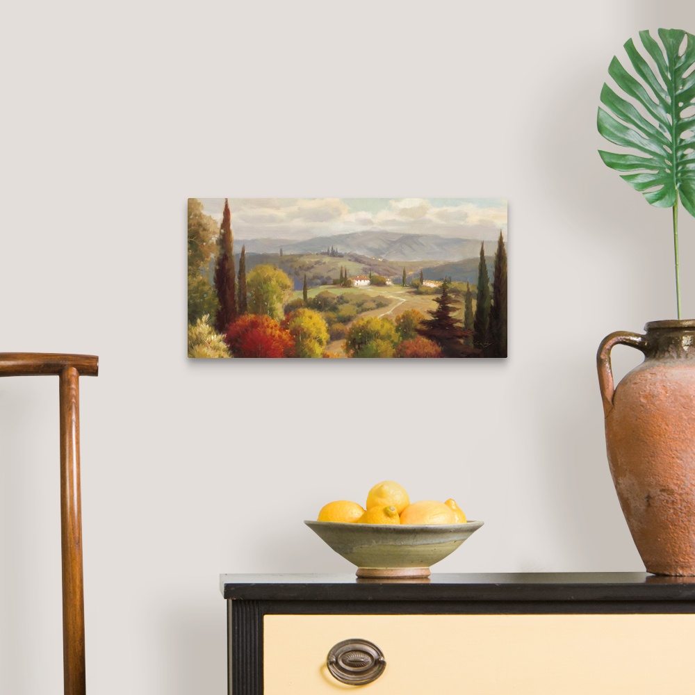A traditional room featuring Contemporary painting of a wide view of the Tuscan country side with rolling hills and a villa.
