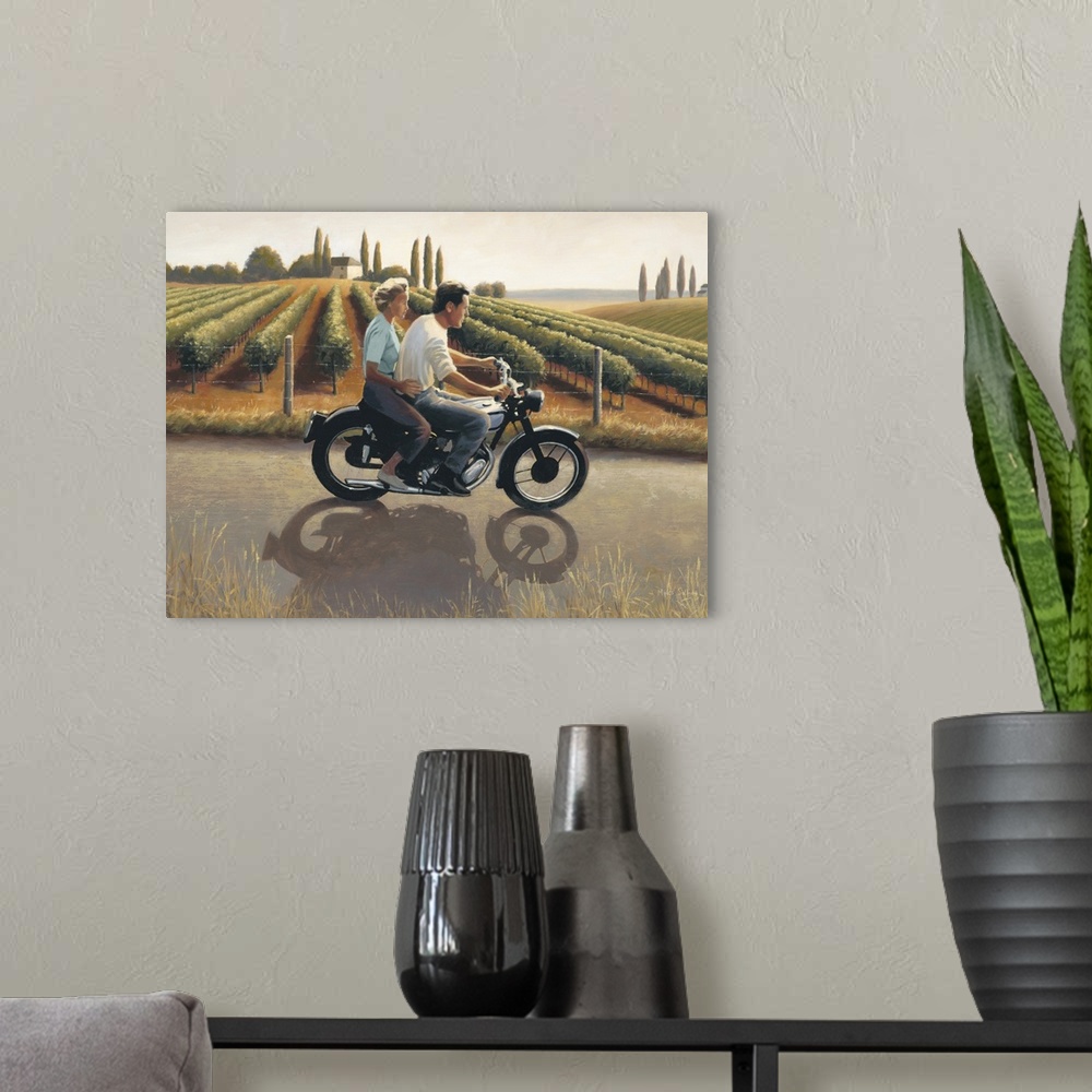A modern room featuring Contemporary painting of a man and woman on a motorcycle riding through Tuscany.