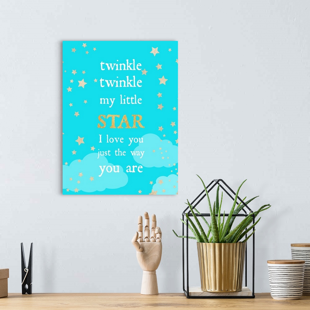 A bohemian room featuring Nursery artwork of a poem with golden stars over a blue sky.