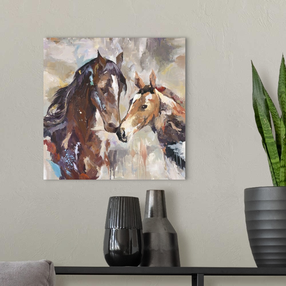 A modern room featuring Home decor artwork of two horses nuzzling.