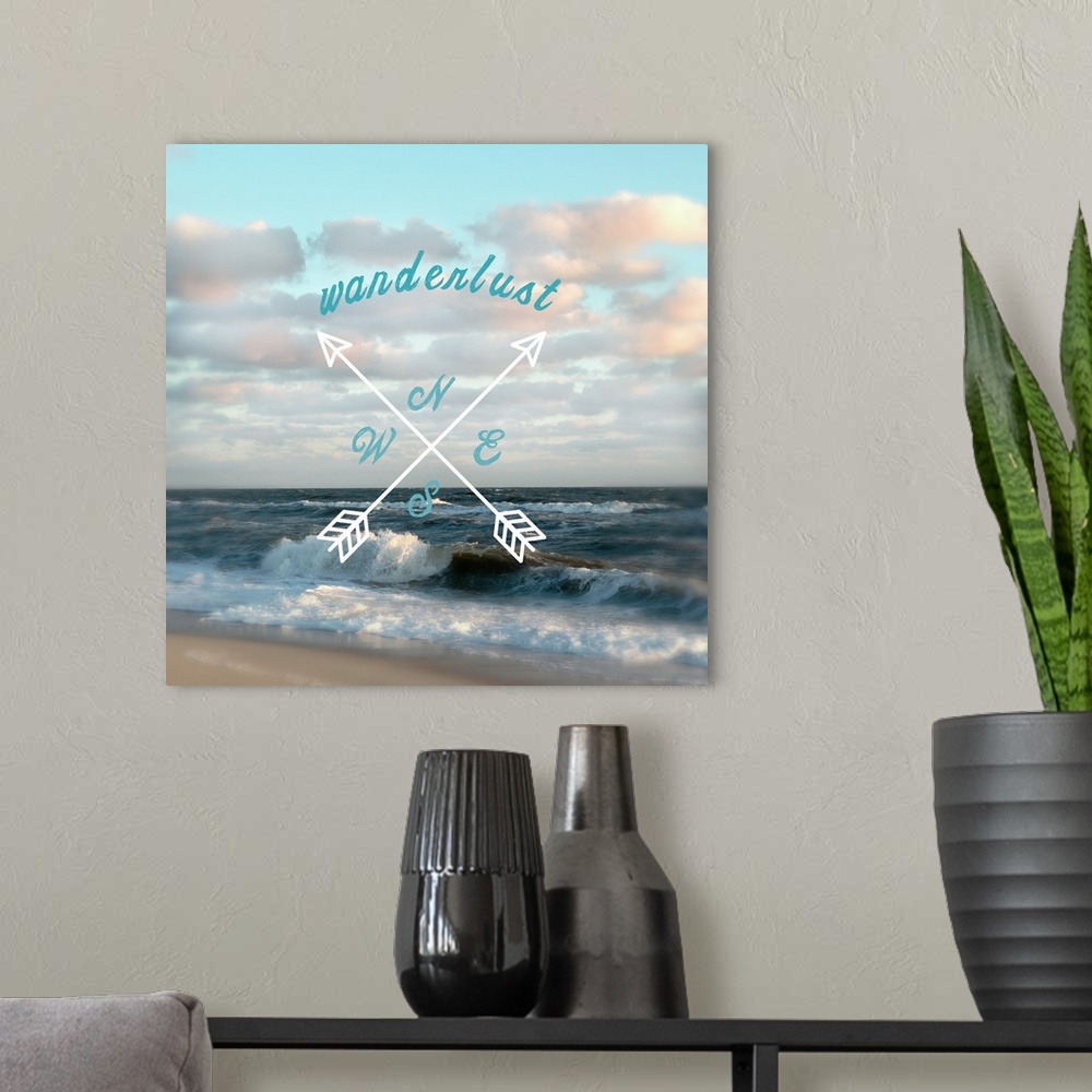 A modern room featuring Beach house decor of arrows and typography design against a beach scene.