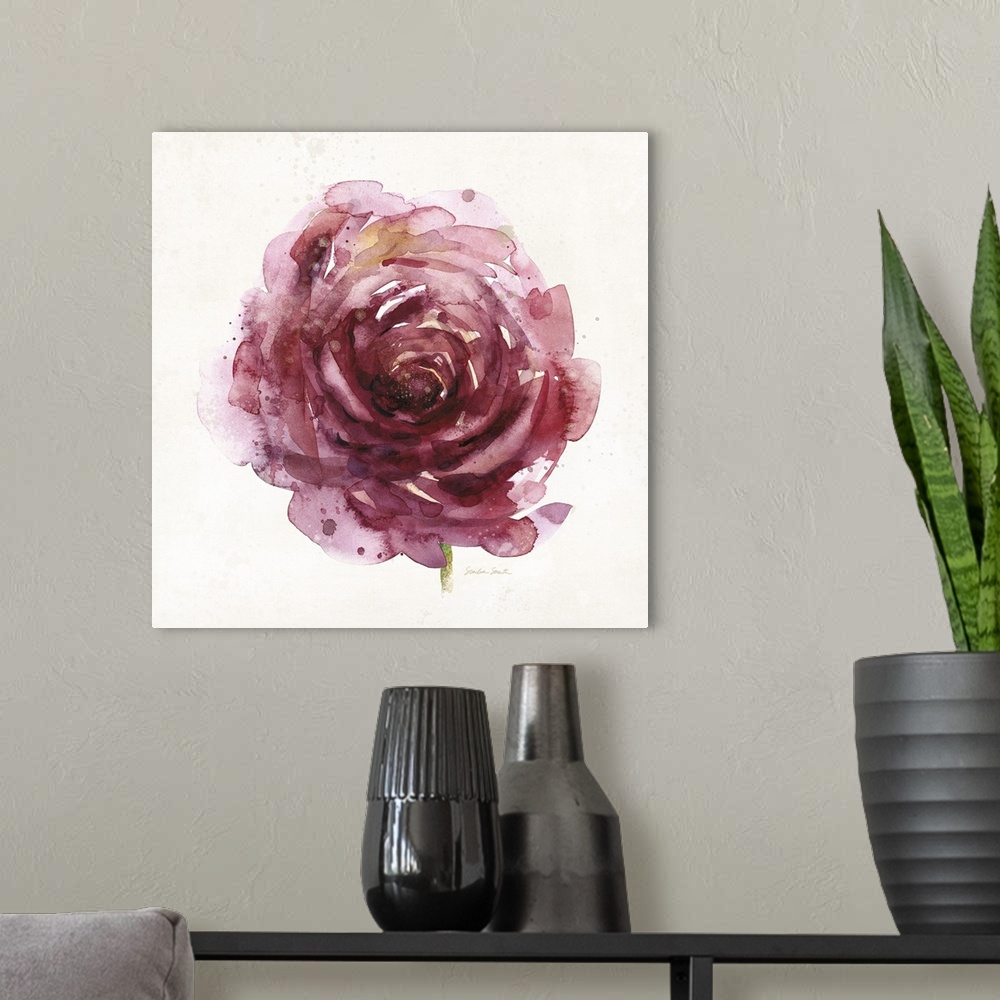 A modern room featuring Watercolor painting of a round red rose.