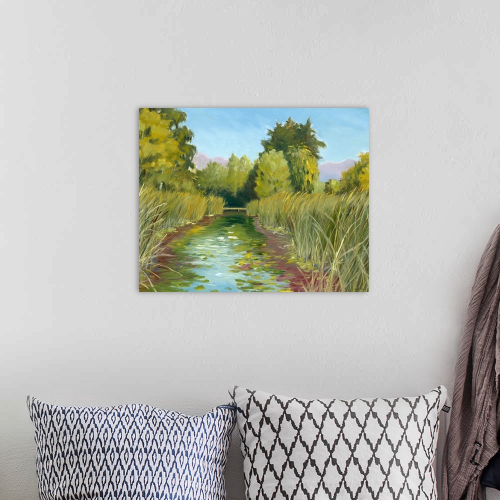 A bohemian room featuring Contemporary artwork of a marsh landscape with tall reeds and lily pads.