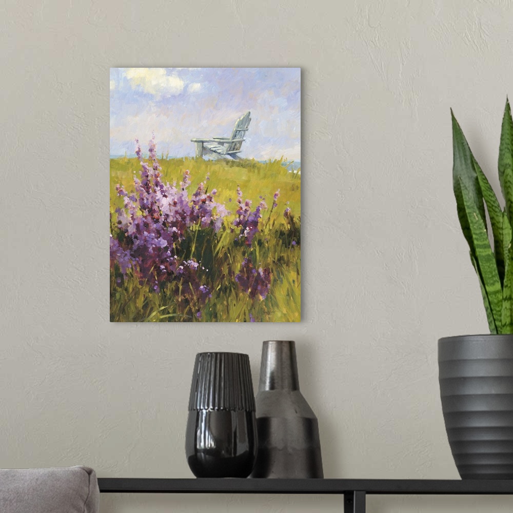 A modern room featuring Contemporary painting of a green field with purple wildflowers, with a white lounge chair in the ...
