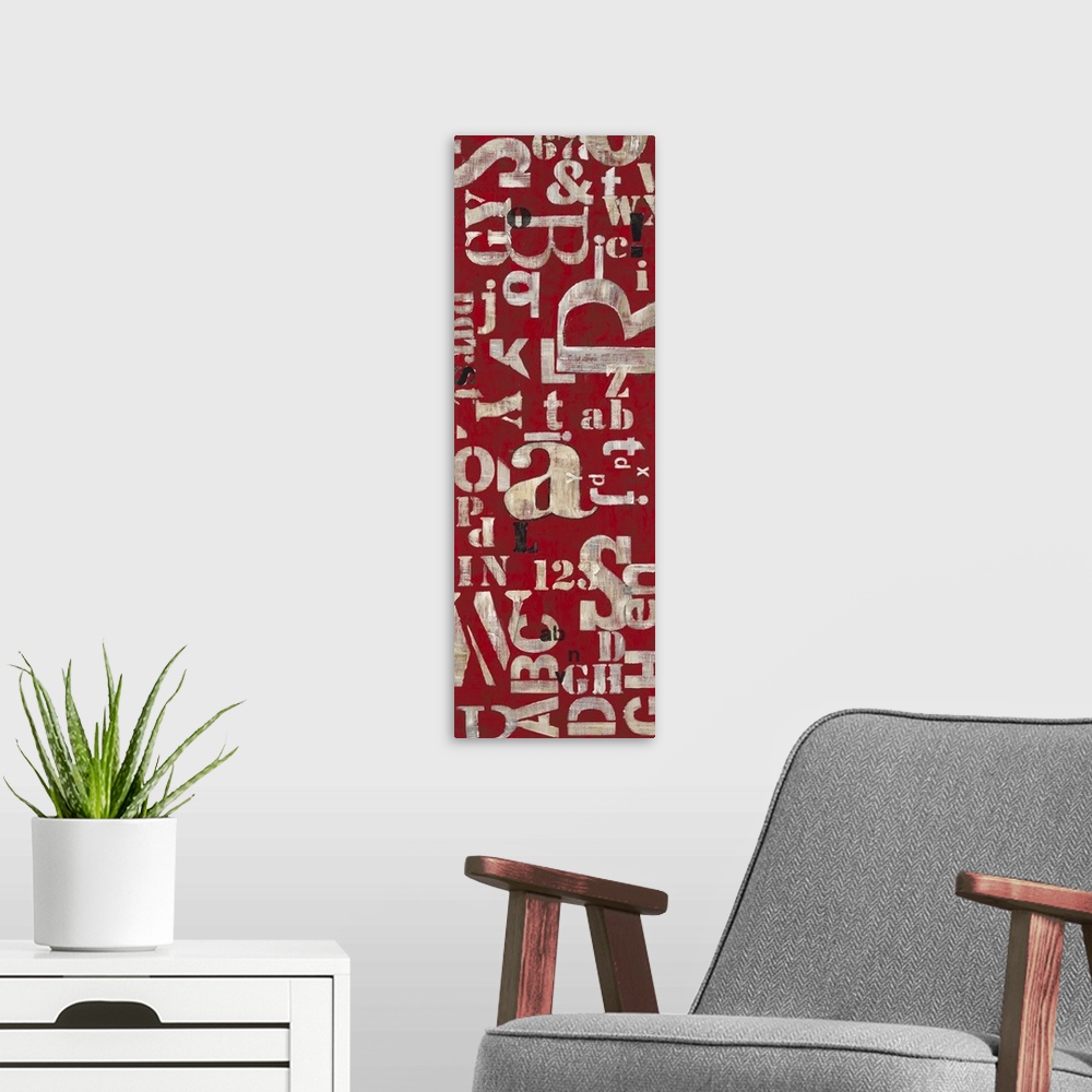 A modern room featuring Contemporary home decor artwork using letters against a deep red background.