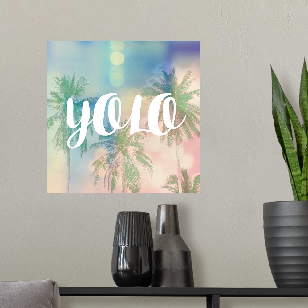 A modern room featuring The text "YOLO" in white over a pastel image of palm trees and bokeh lights.
