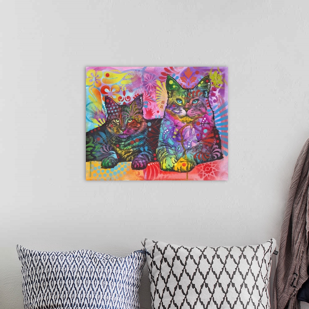 A bohemian room featuring Illustration of two cats with graffiti designs all over.