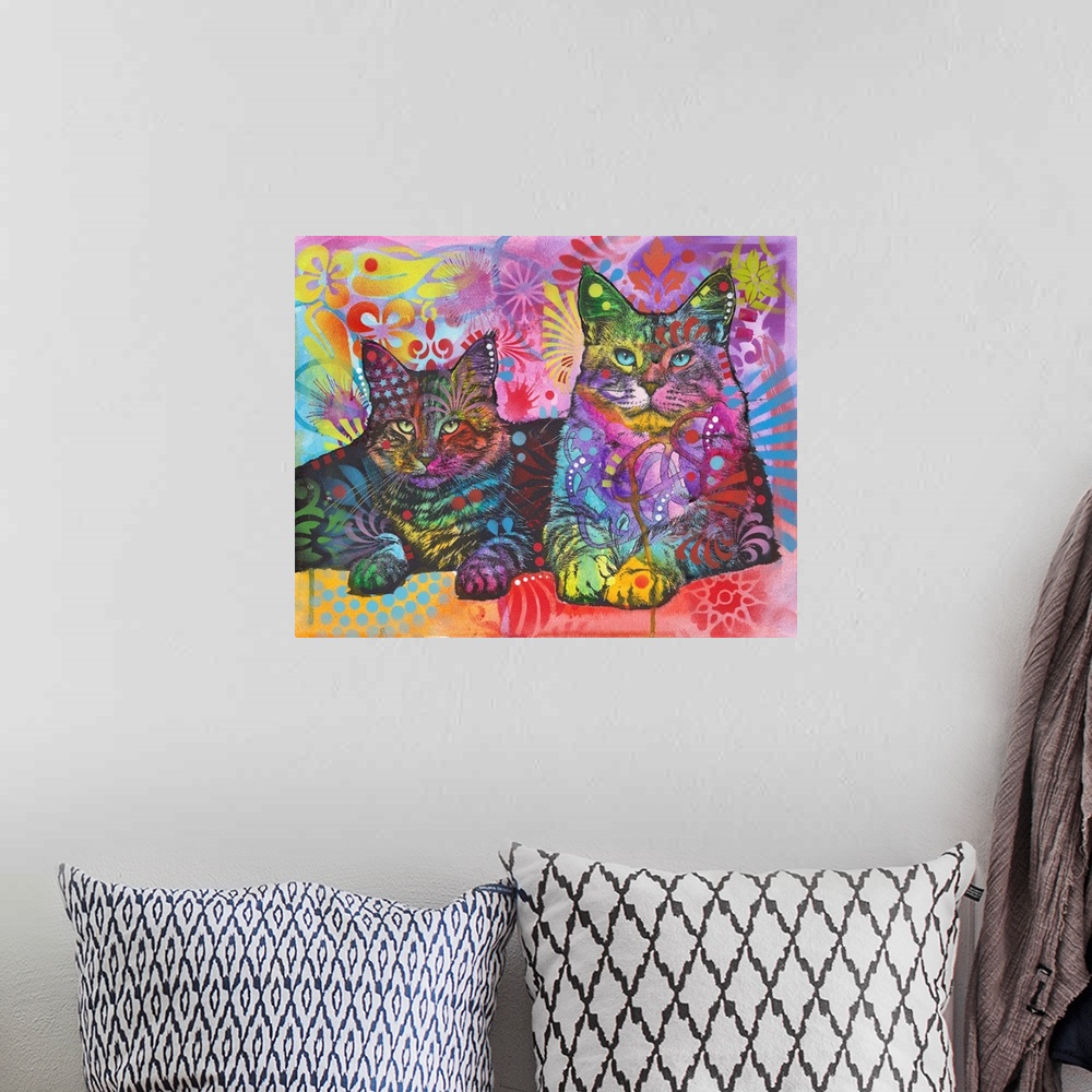 A bohemian room featuring Illustration of two cats with graffiti designs all over.