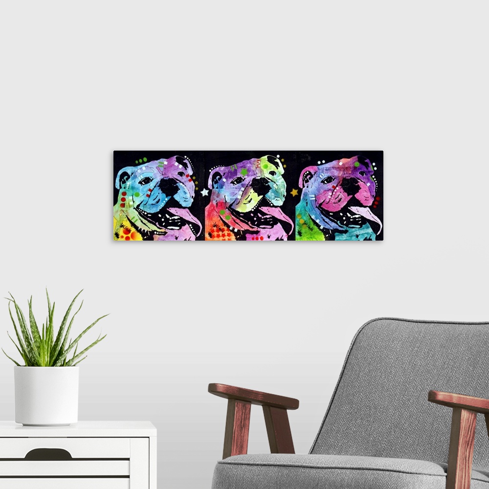A modern room featuring Three colorful bulldogs lined up next to each other with their tongues hanging out on a black bac...