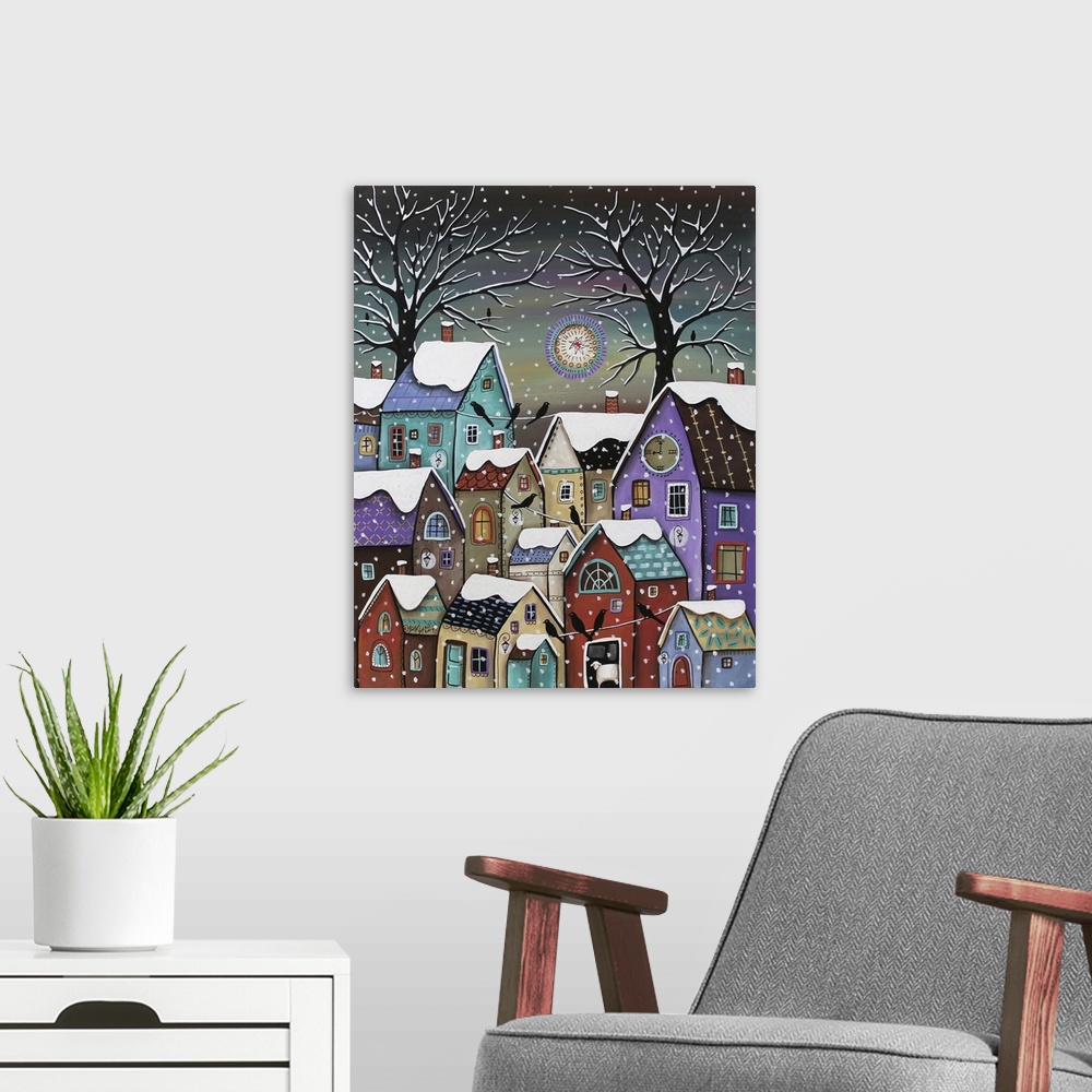 A modern room featuring Contemporary painting of a village made of different colored houses in the snow.