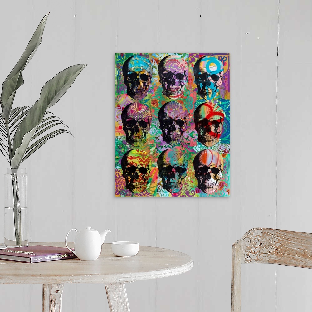 A farmhouse room featuring 9 skulls in three rows with colorful abstract designs all over.