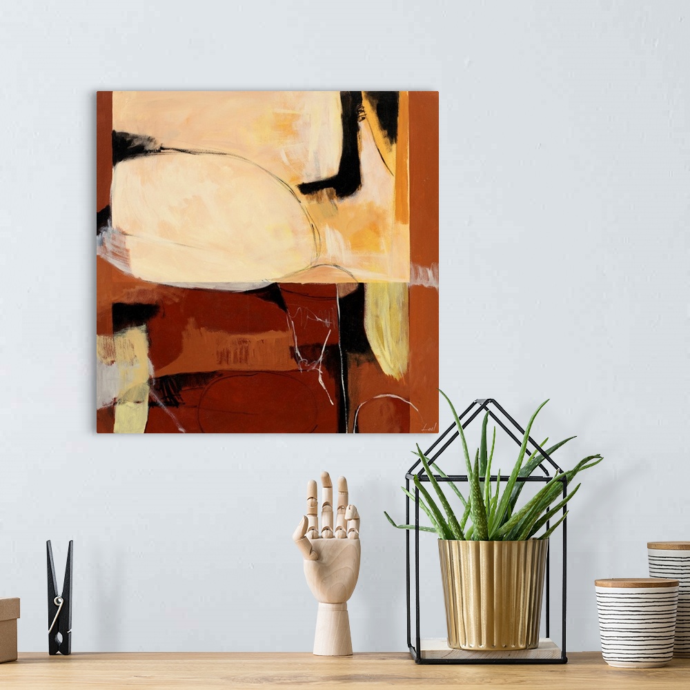 A bohemian room featuring Abstract painting with shapes of faces in shades of whites and browns.
