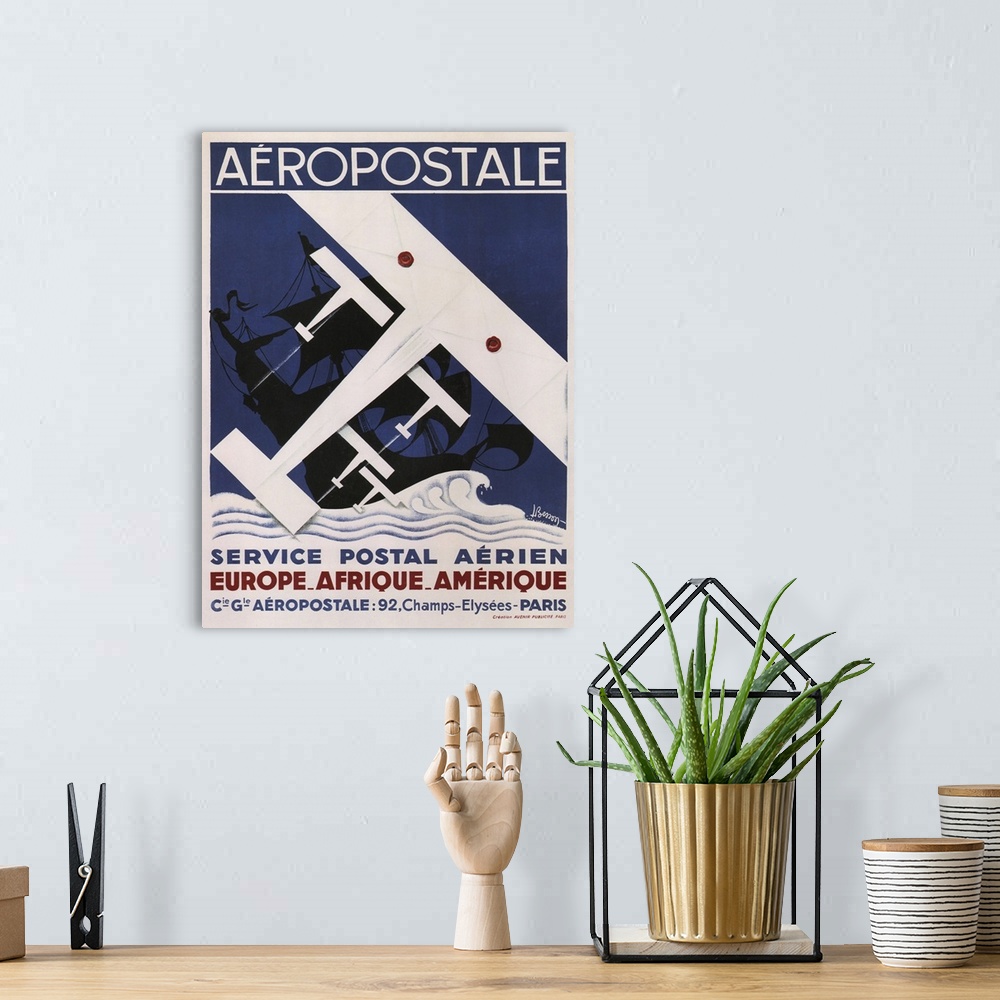A bohemian room featuring Vintage poster advertisement for Aeropostale.