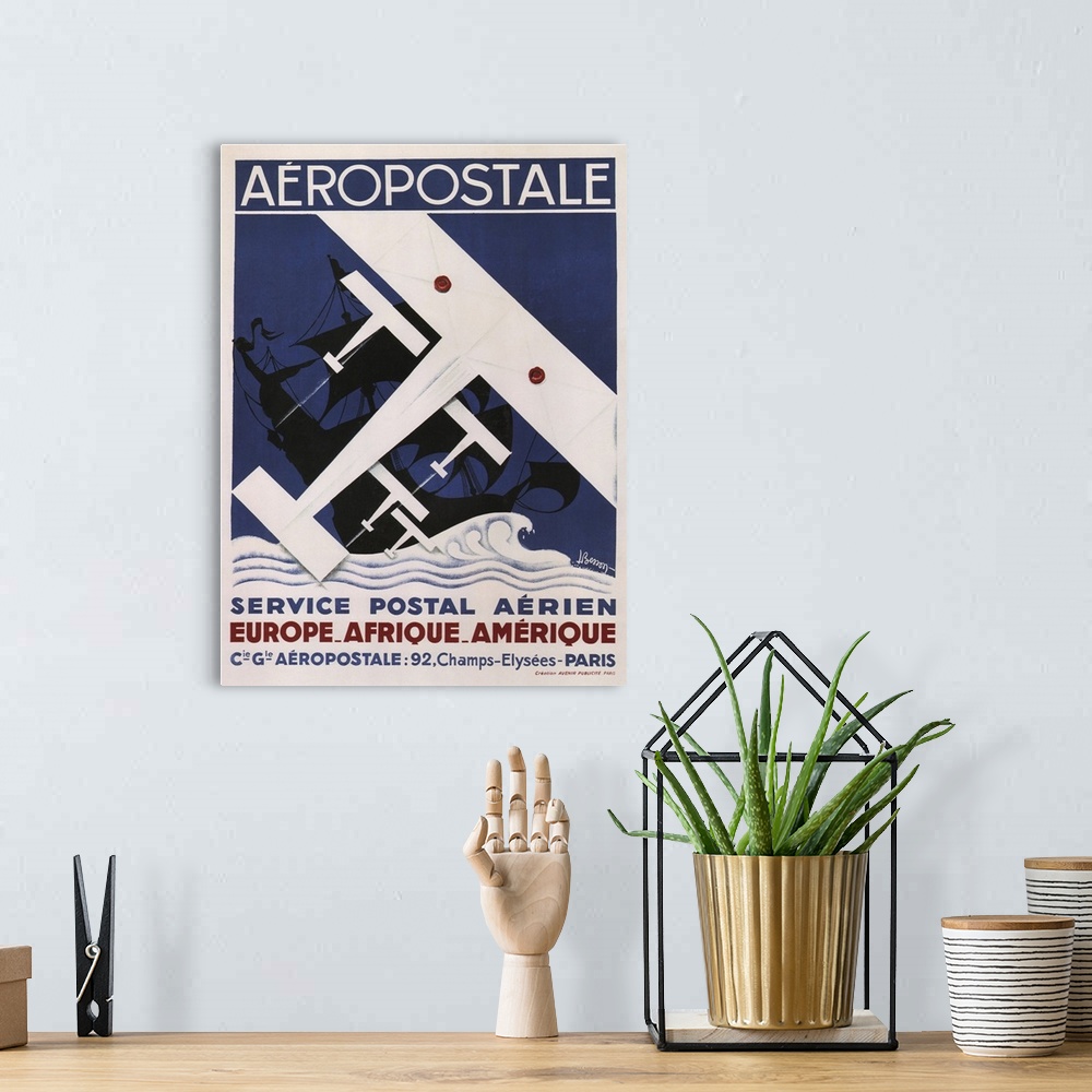 A bohemian room featuring Vintage advertisement for Aeropostale Postal Service.