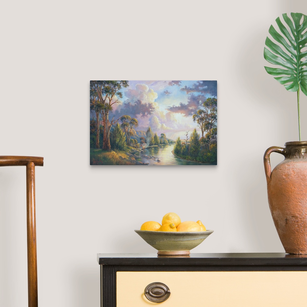 A traditional room featuring Contemporary painting of an idyllic river scene with massive clouds hovering overhead.
