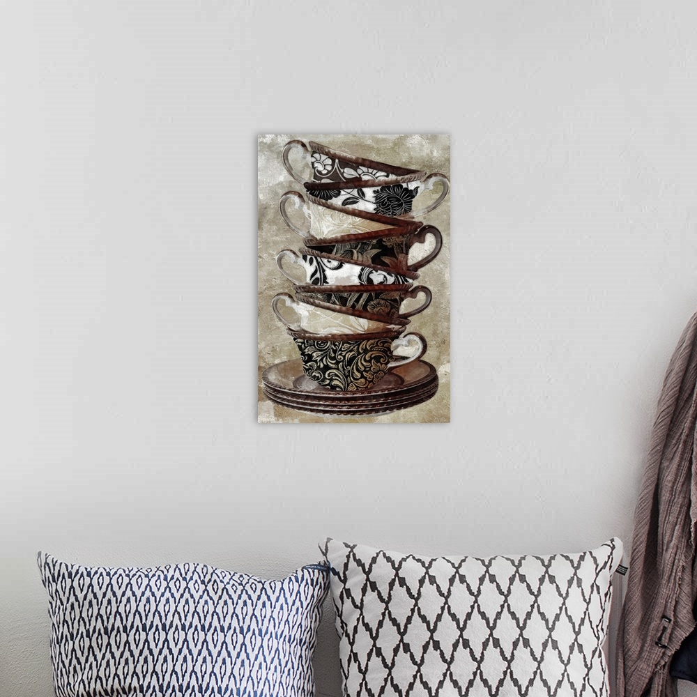 A bohemian room featuring Docor perfect for the kitchen of a stack of eight tea cups all painted with neutral colored designs.