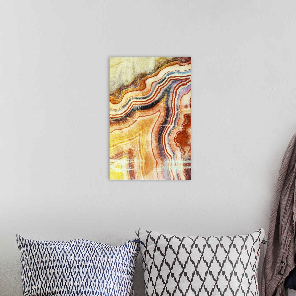 A bohemian room featuring Warm toned agate digital art made up of tiny swirls.
