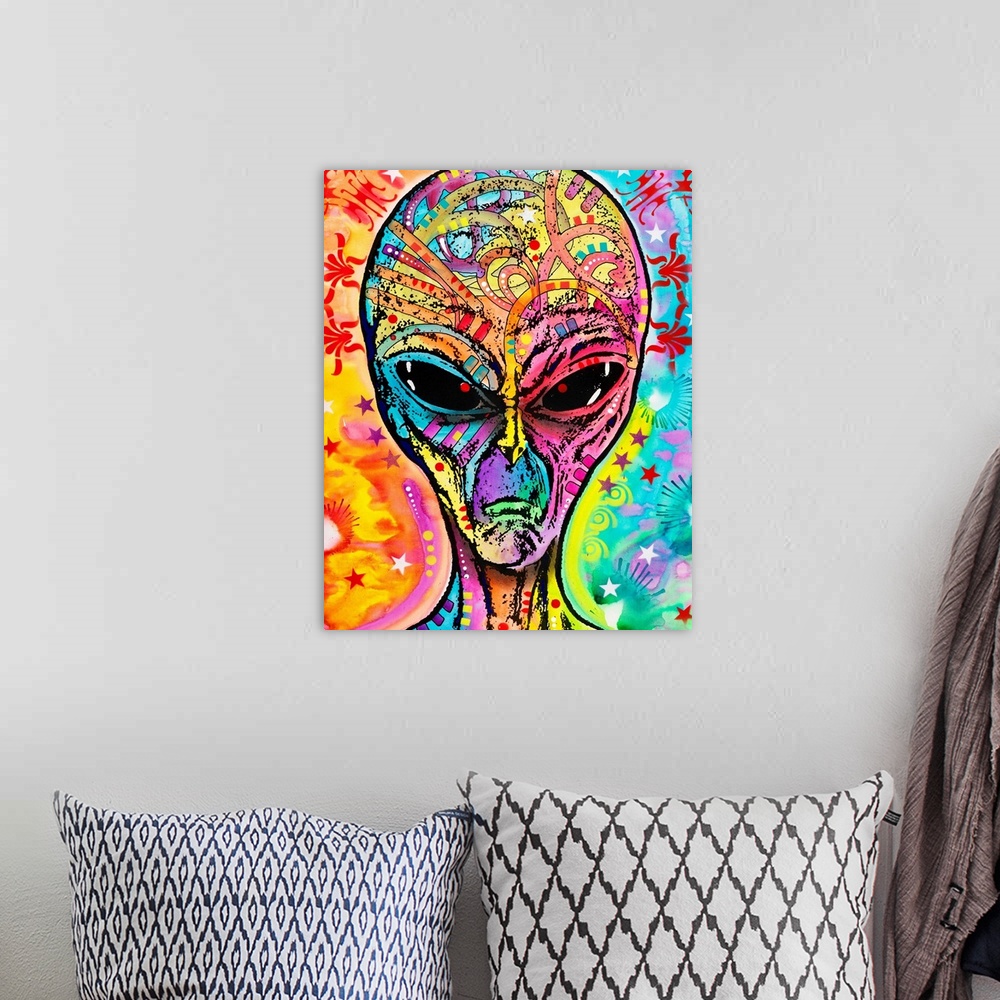A bohemian room featuring Colorful painting of an alien with abstract markings all over.