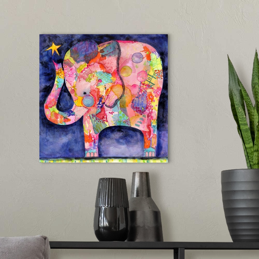 A modern room featuring Painting of a colorful elephant with a star above it's trunk.