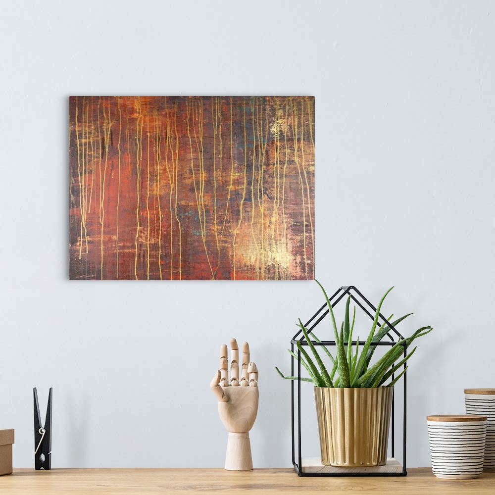 A bohemian room featuring Contemporary abstract painting resembling rust.