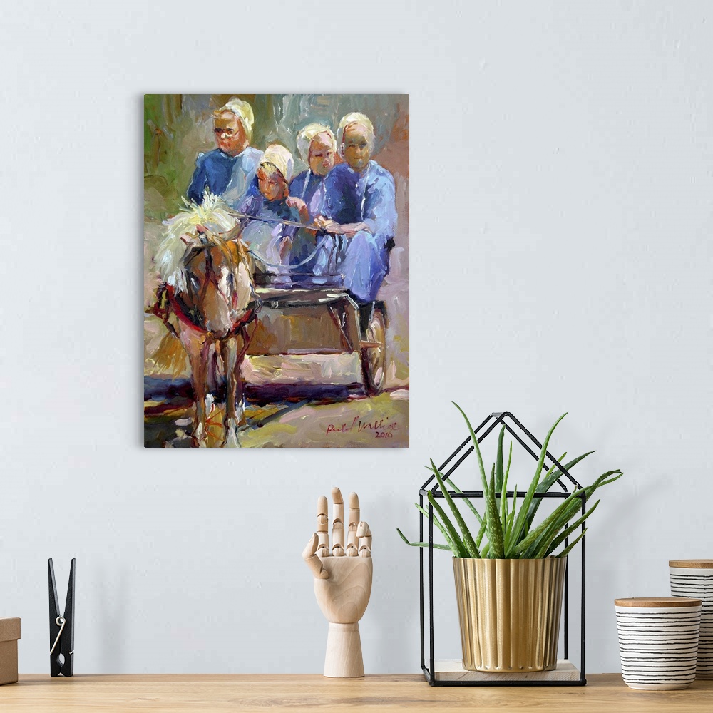 A bohemian room featuring Contemporary painting of Amish women in horse drawn cart.