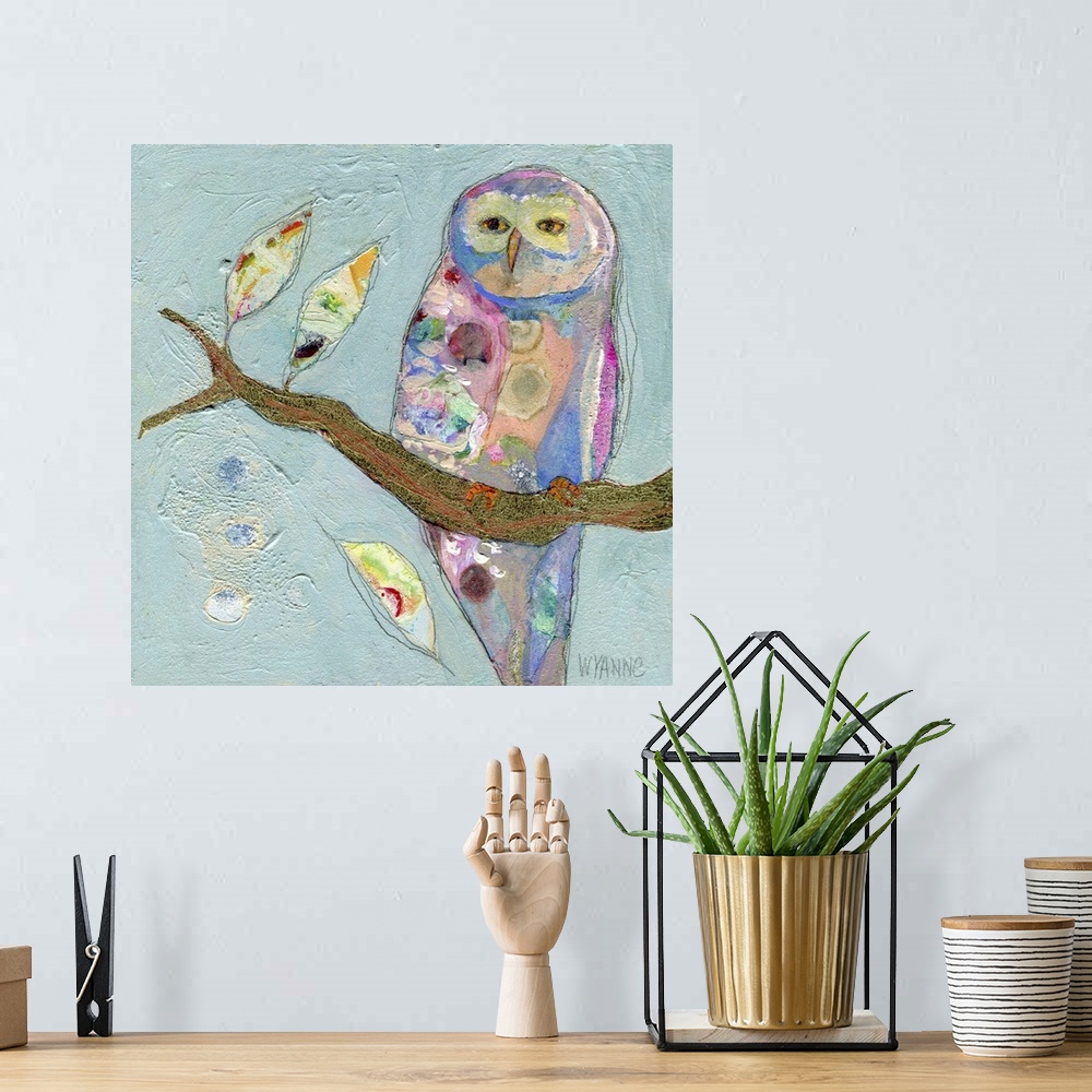 A bohemian room featuring A pastel colored owl sitting on a branch.