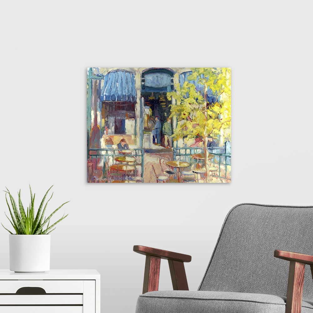 A modern room featuring Contemporary colorful painting of an outdoor seating at a cafe.