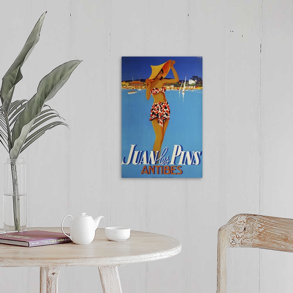 A farmhouse room featuring Vintage travel advertisement for Antibes.